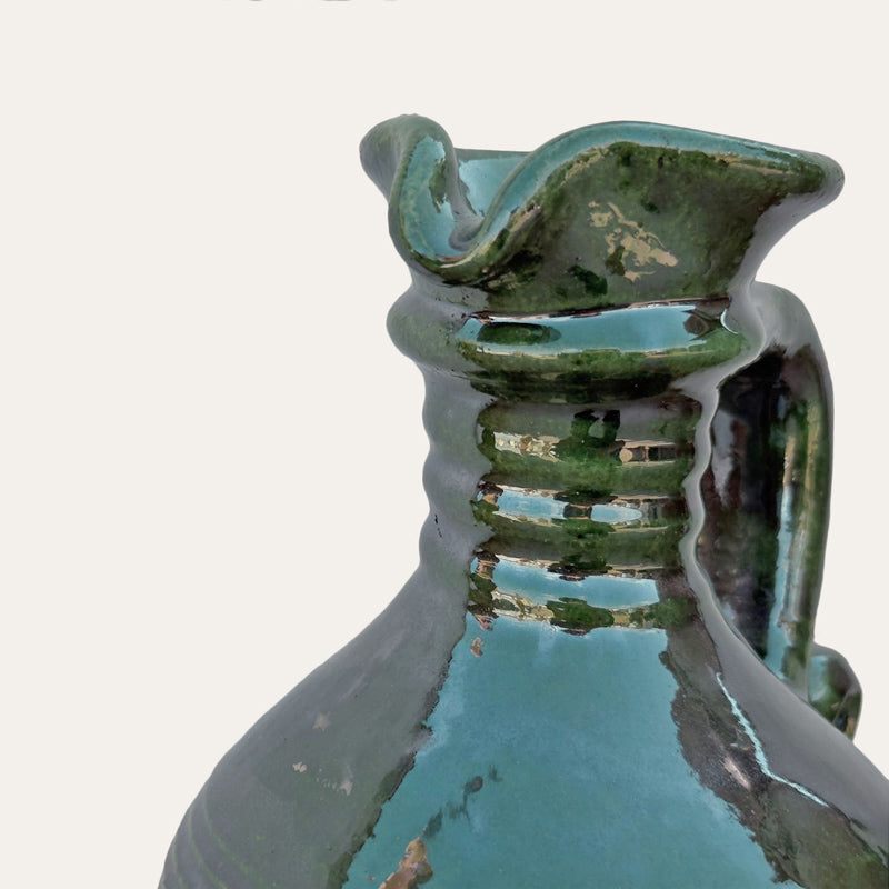 Alcuza ceramic oil vessel by Pablo Tito with green copper oxide finish, handcrafted in Andalusia, Spain.