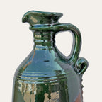 Alcuza ceramic oil vessel by Pablo Tito with green copper oxide finish, handcrafted in Andalusia, Spain.