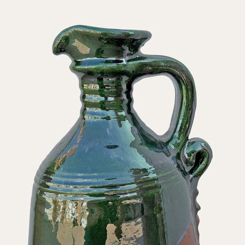Alcuza ceramic oil vessel by Pablo Tito with green copper oxide finish, handcrafted in Andalusia, Spain.