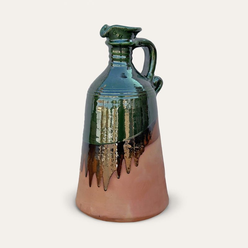 Alcuza ceramic oil vessel by Pablo Tito with green copper oxide finish, handcrafted in Andalusia, Spain.