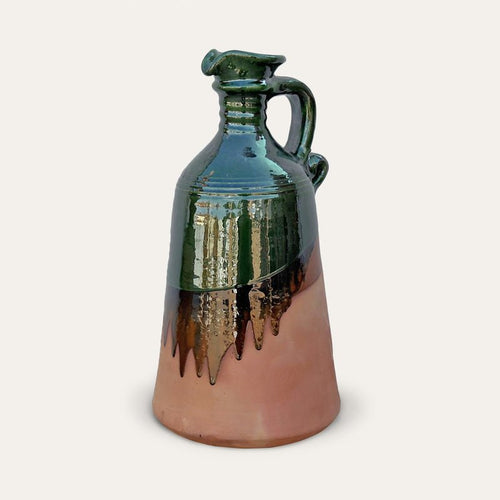 Alcuza ceramic oil vessel by Pablo Tito with green copper oxide finish, handcrafted in Andalusia, Spain.