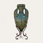 Alhambra green ceramic floor vase by Pablo Tito with intricate latticework and relief carving, handcrafted in Andalusia, Spain.