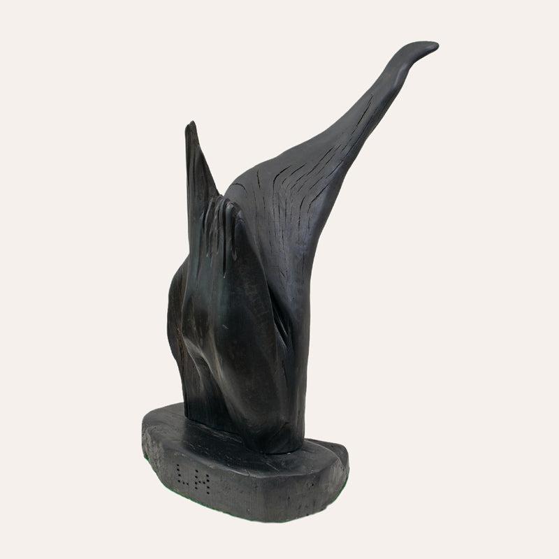 Arising bog oak sculpture by Larry Harney, hand-carved from prehistoric Irish bog oak.