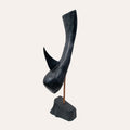 Catch of the Ages bog oak sculpture by Larry Harney, hand-carved from prehistoric Irish bog oak.