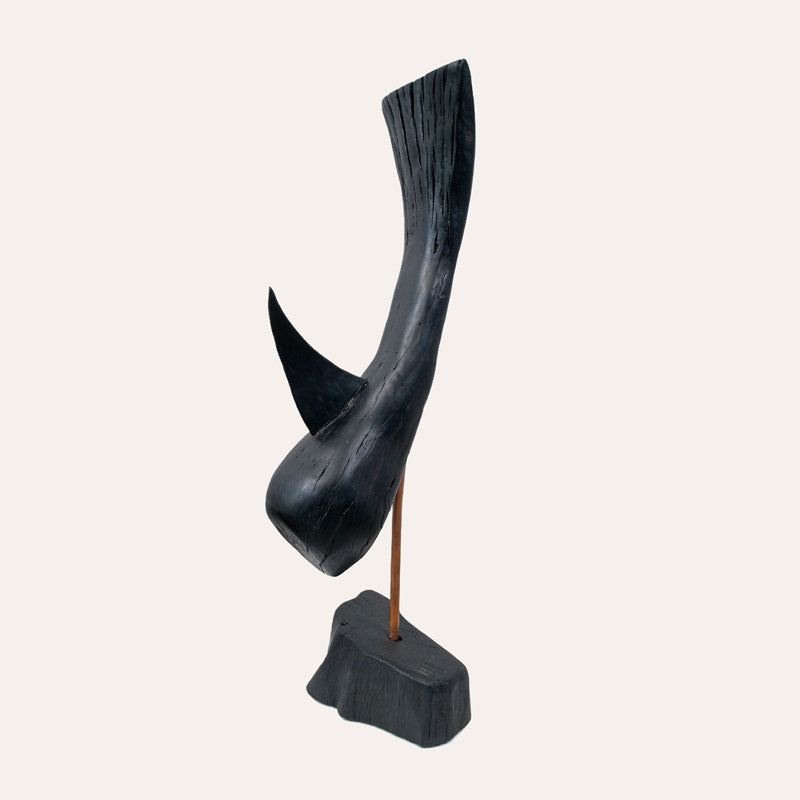 Catch of the Ages bog oak sculpture by Larry Harney, hand-carved from prehistoric Irish bog oak.