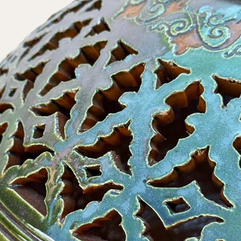 Centro Gomero Calado sculptural ceramic centerpiece by Pablo Tito featuring geometric openwork, handcrafted in Andalusia, Spain.
