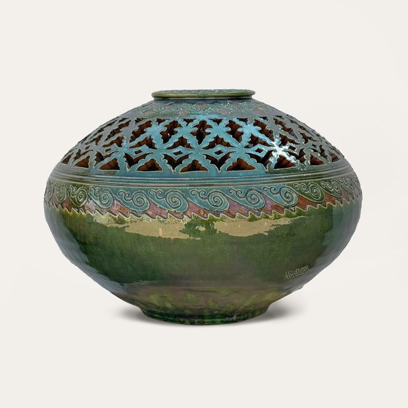 Centro Gomero Calado sculptural ceramic centerpiece by Pablo Tito featuring geometric openwork, handcrafted in Andalusia, Spain.