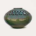 Centro Gomero Calado sculptural ceramic centerpiece by Pablo Tito featuring geometric openwork, handcrafted in Andalusia, Spain.