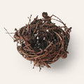 Handwoven larch twig nest sculpture by Irish artisan Joe Hogan, created from natural materials gathered across the Irish landscape.