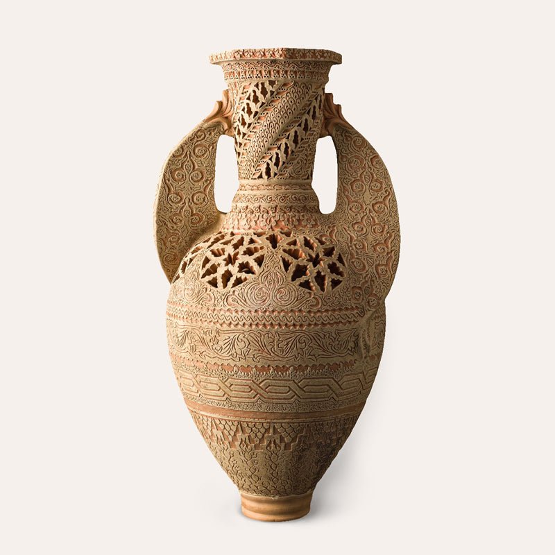Luz de Andalucía sculptural floor vase by Pablo Tito with hand-carved geometric openwork.
