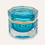 Medium octagonal light-blue Murano glass jewelry box with 24K gold metal detailing and polished surfaces, handcrafted on Murano Island in Venice, Italy.