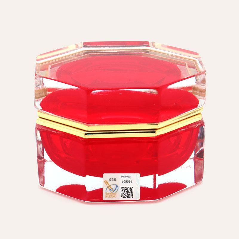 Medium octagonal red Murano glass jewelry box with 24K gold metal detailing and polished surfaces, handcrafted on Murano Island in Venice, Italy.