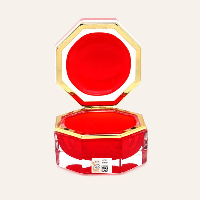 Medium octagonal red Murano glass jewelry box with 24K gold metal detailing and polished surfaces, handcrafted on Murano Island in Venice, Italy.