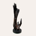 Oremus bog oak sculpture by Larry Harney, hand-carved from prehistoric Irish bog oak.