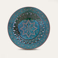 Plato Calado Estrella openwork ceramic wall plate by Pablo Tito with green and brown tones, featuring an intricate star motif, handcrafted in Andalusia, Spain.