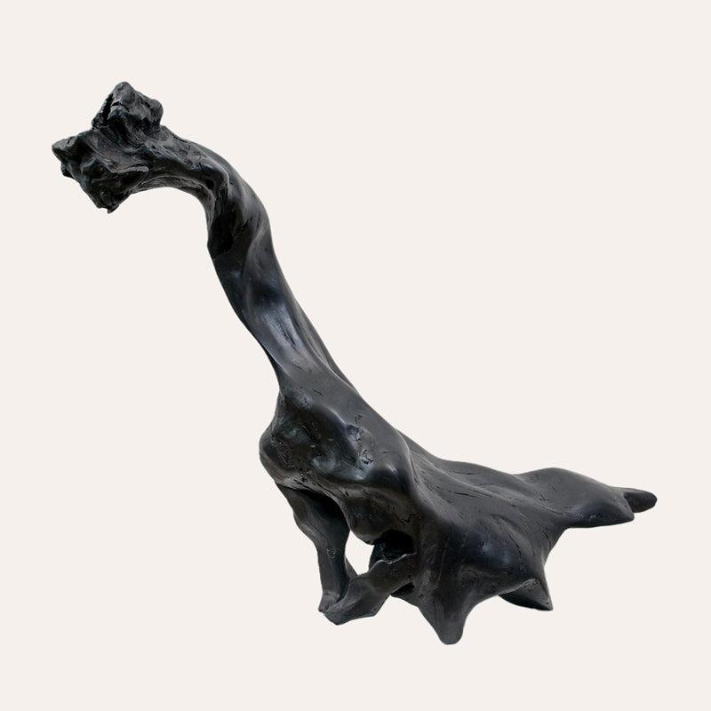 Primal Creatrure bog oak sculpture by Larry Harney, hand-carved from prehistoric Irish bog oak.