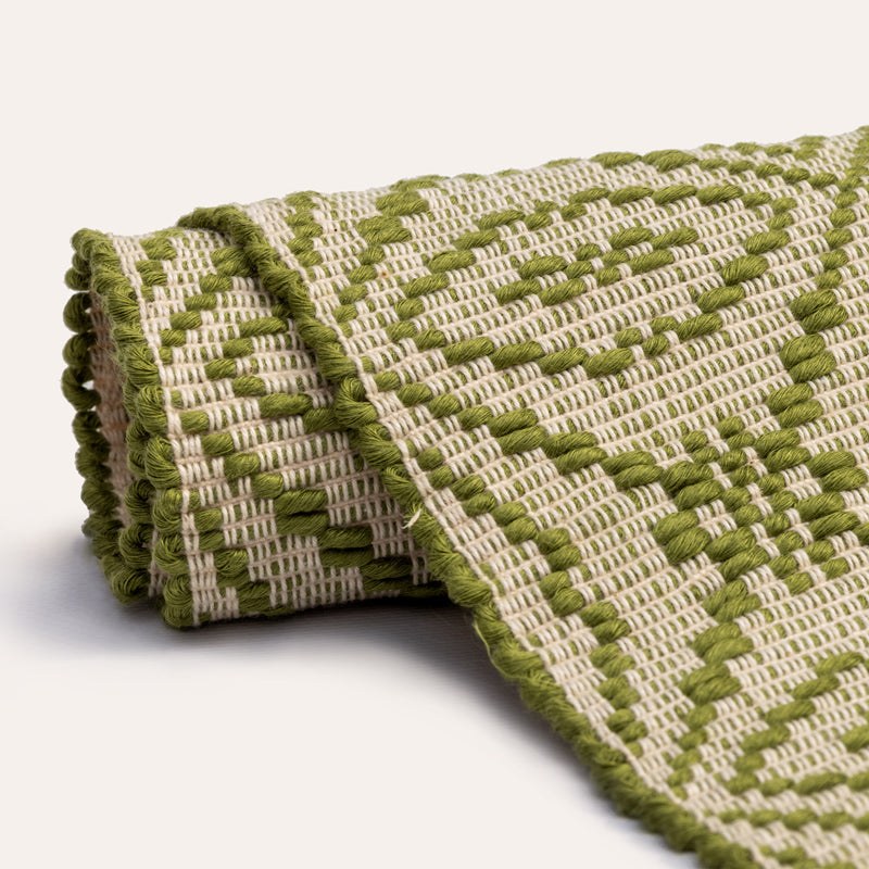 Sa Mendula Sardinian handwoven green-cream linen rug by Anna Deriu, woven on a traditional Sardinian horizontal loom.