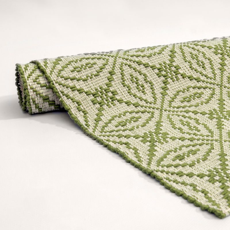 Sa Mendula Sardinian handwoven green-cream linen rug by Anna Deriu, woven on a traditional Sardinian horizontal loom.