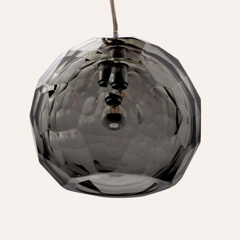 Medium grey spherical Murano glass pendant lamp with a hand-sculpted faceted surface, handcrafted on Murano Island in Venice, Italy.