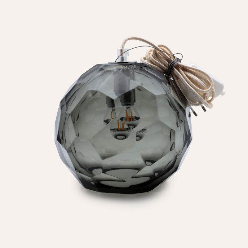 Medium grey spherical Murano glass pendant lamp with a hand-sculpted faceted surface, handcrafted on Murano Island in Venice, Italy.