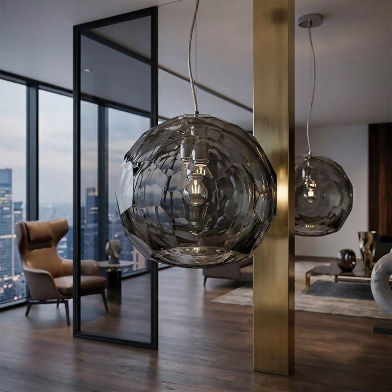 Medium grey spherical Murano glass pendant lamp with a hand-sculpted faceted surface, handcrafted on Murano Island in Venice, Italy.