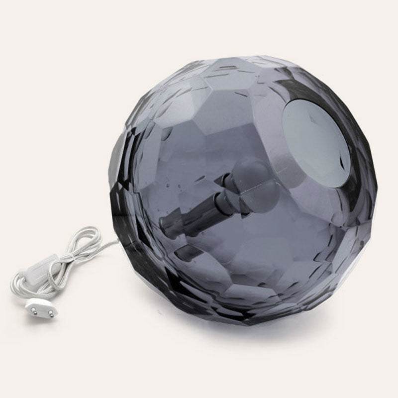 Medium grey spherical Murano glass table lamp with a hand-sculpted faceted surface, handcrafted on Murano Island in Venice, Italy.