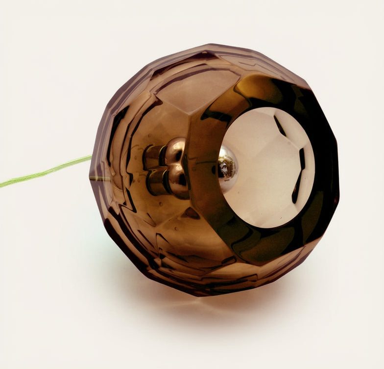 Small tobacco spherical Murano glass table lamp with a hand-sculpted faceted surface, handcrafted on Murano Island in Venice, Italy.