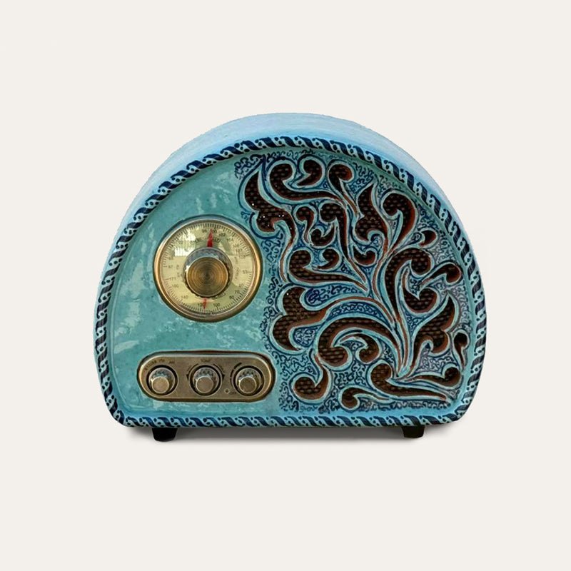 Wave handcrafted ceramic Bluetooth radio by Pablo Tito with a light blue finish, handcrafted in Andalusia, Spain.